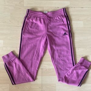 Brand new! Small Adidas lilac sweat pants with black stripes on side.